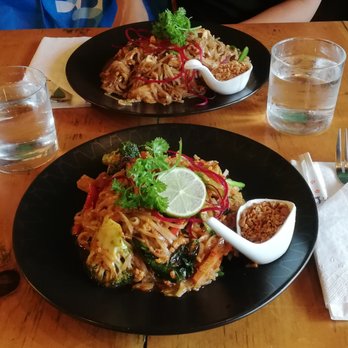 Imm Thai Kitchen - Tom Yum Pad Thai (front) and Famous Pad Thai (back) - Thai Near Me - Toronto, Ontario Imm Thai Kitchen - Tom Yum Pad Thai (front) and Famous Pad Thai (back) - Thai Near Me - Toronto, Ontario