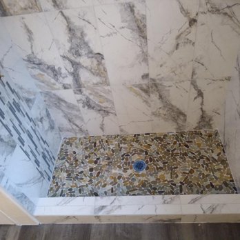 Silver Creek Design - bathroom remodel flooring, stone shower floor, 12"x24" wall tile for this custom shower - Flooring Near Me - Durango, Colorado Silver Creek Design - bathroom remodel flooring, stone shower floor, 12"x24" wall tile for this custom shower - Flooring Near Me - Durango, Colorado