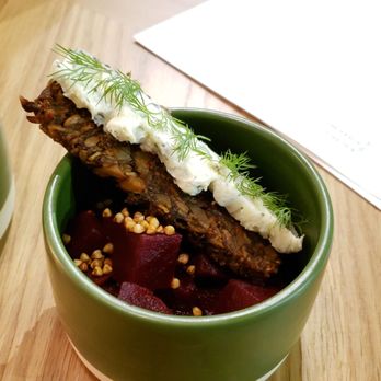 Houndstooth Restaurant - Pickled red beets topped with buckwheat groats & a rye bread stick smeared with a herbed cream cheese topped with fresh dill fronds. - New American Near Me - Benton Harbor, Michigan