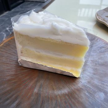 Ko thai restaurant - Young coconut cake (not too sweet!) - Thai Near Me - Fort Worth, Texas Ko thai restaurant - Young coconut cake (not too sweet!) - Thai Near Me - Fort Worth, Texas