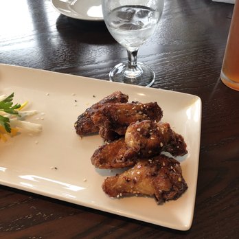 The Calcutta Grill - Sticky Wings - New American Near Me - Newcastle, Washington