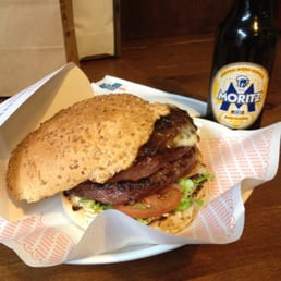 Double bacon burger with all the toppings! And a Moritz to complement the flavors.