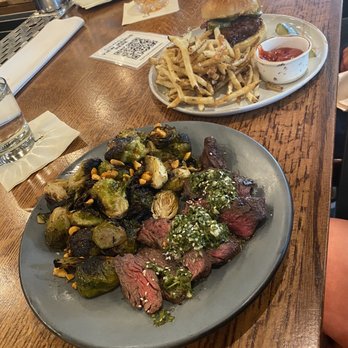 The Crunkleton - Hanger steak w/Brussels sprouts; chicken sandwich - Cocktail Bars Near Me - Charlotte, North Carolina The Crunkleton - Hanger steak w/Brussels sprouts; chicken sandwich - Cocktail Bars Near Me - Charlotte, North Carolina
