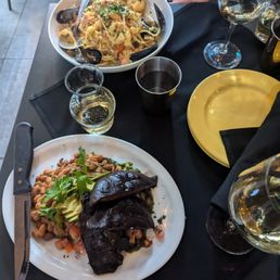 Seafood pasta bowl and vegetarian cubanette sandwich at Bodega Tapa Bar, Victoria BC June 2024 Seafood pasta bowl and vegetarian cubanette sandwich at Bodega Tapa Bar, Victoria BC June 2024