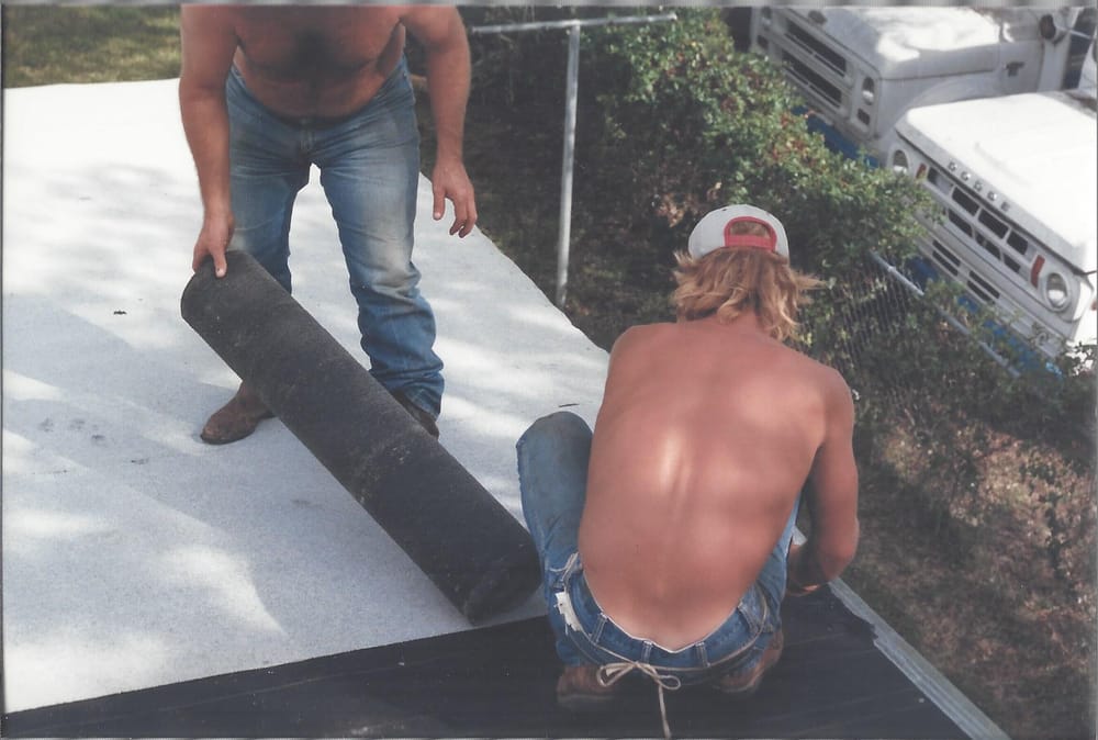 Slide of Tooter's Roofing