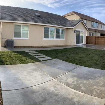 Choice One Landscape - Concrete pad, steps, and grass - Landscaping Near Me Choice One Landscape - Concrete pad, steps, and grass - Landscaping Near Me