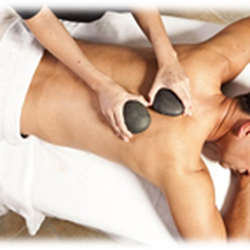 Hand & Stone Massage and Facial Spa - Our Signature Hot Stone Massage