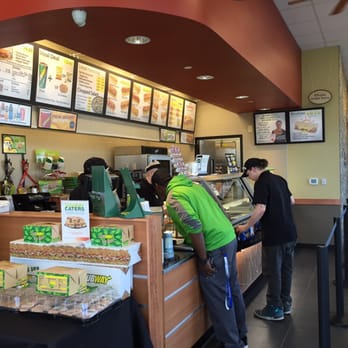 Subway - a man ordering food at the counter - Sandwiches Near Me - Chester, Virginia