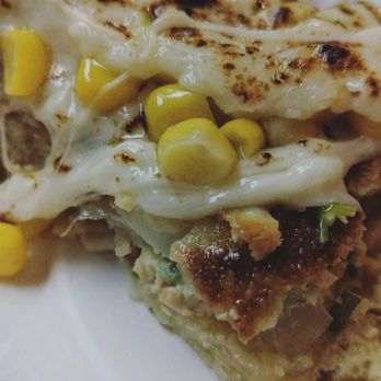 Martabak Ok - Basically a fried crepe stuffed with egg and chicken with tons of mozzarella on top and corn and then torched to melt - Indonesian Near Me - Philadelphia, Pennsylvania Martabak Ok - Basically a fried crepe stuffed with egg and chicken with tons of mozzarella on top and corn and then torched to melt - Indonesian Near Me - Philadelphia, Pennsylvania