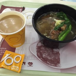 Beef brisket with noodles and a cup of coffee