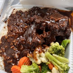 Flames Restaurant - Oxtail with white rice and steamed vegetables. Crack!!!