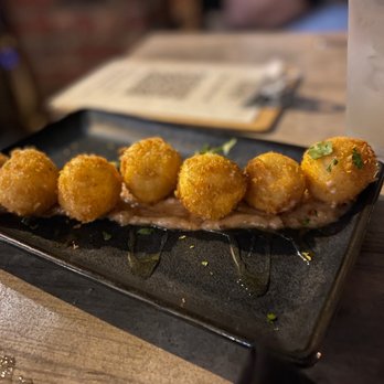 The Exchange Pub + Kitchen - Goat cheese fritters - Gastropubs Near Me - New Albany, Indiana
