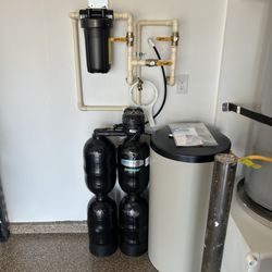 Kinetico Quality Water Systems - Premium garage installation of our Kinetico non-electrical whole home hybrid water system. Designed for efficiency and reliability