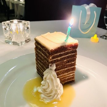 Ocean Prime - 12 layer carrot cake with pineapple syrup - Seafood Near Me - Dallas, Texas Ocean Prime - 12 layer carrot cake with pineapple syrup - Seafood Near Me - Dallas, Texas