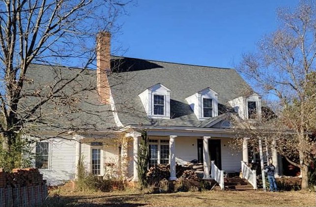 Slide of Chris Moore Roofing