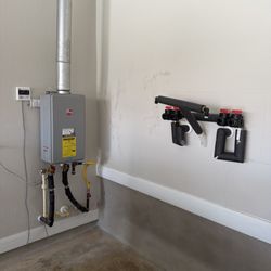 Caliente Plumbing Heating & Air - Flushed tankless water heater & removed water softner temporarily for garage epoxy coating installation