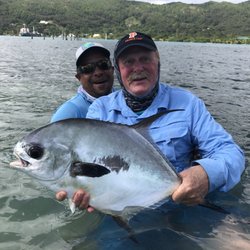 Iphoto Canvas - 15# Permit caught with great Guide Rankin...Rockin' Guanaja