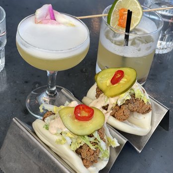 The Peterboro - Korean Chicken Bao + Honey Bee Sour (seasonal) ; RTD Little Venom - Chinese Near Me - Detroit, Michigan The Peterboro - Korean Chicken Bao + Honey Bee Sour (seasonal) ; RTD Little Venom - Chinese Near Me - Detroit, Michigan