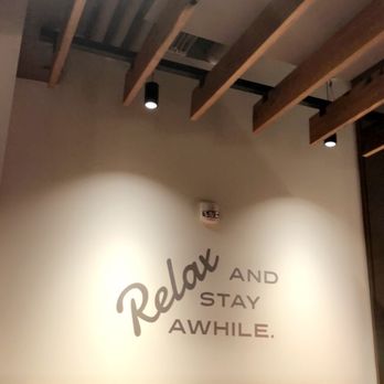 Thirsty Fox - relax and stay awhile sign on the wall - Bars Near Me - Lexington, Kentucky
