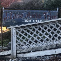 J Line Auto Trim - Sign of the business where you don't want to take your car to get painted.