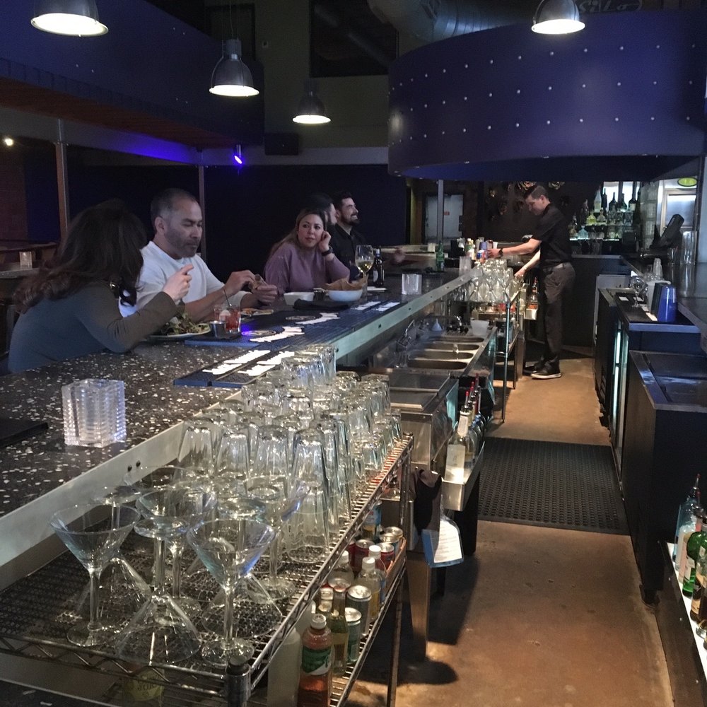 SILO Alamo Heights - people sitting at a bar - New American Near Me - San Antonio, Texas