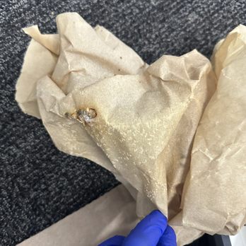 Extra Space Storage - Mold growing on wrapping paper of glasses - Self Storage Near Me - Cerritos, California
