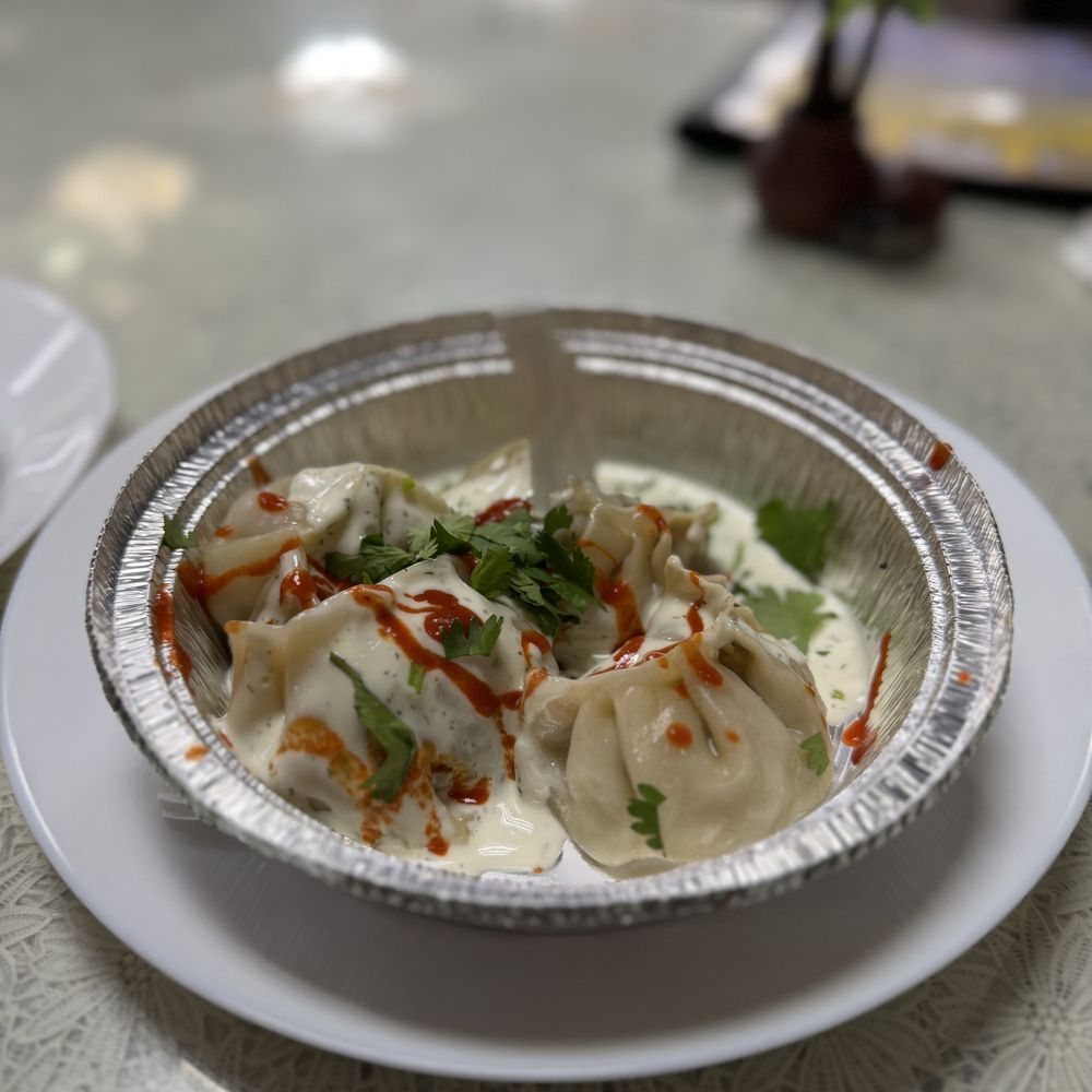 Kabab King - 4 Steamed Chicken Momos (~$6) - Indian Near Me - Jackson Heights, New York Kabab King - 4 Steamed Chicken Momos (~$6) - Indian Near Me - Jackson Heights, New York