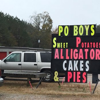 Papa Bear's Produce Stand - a sign that says po boys sweet potatoes alligators cakes pies and pies - Grocery Near Me - Seminary, Mississippi Papa Bear's Produce Stand - a sign that says po boys sweet potatoes alligators cakes pies and pies - Grocery Near Me - Seminary, Mississippi