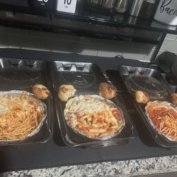 Hot Rocks Pizza - From left to right: baked spaghetti, baked ziti, and regular spaghetti (with garlic knots, taste tested)