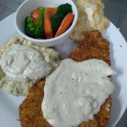 The Roadstop - Chicken fried pork steak and mash potatoes. All home made and very good. The mash potatoes were not boxed mashed, very good.
