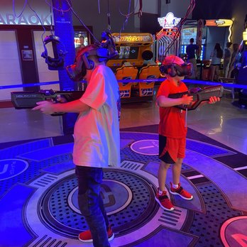 Andy B's Bowl Social - two people playing video games - Bowling Near Me - Branson, Missouri