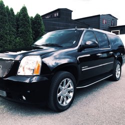 DrivingBG - 2014 Yukon Denali XL Black with black interior.