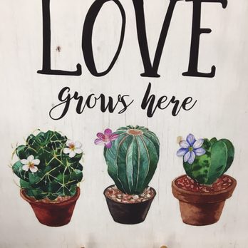 World Market - love grows here sign - Beer, Wine & Spirits Near Me - Middleton, Wisconsin World Market - love grows here sign - Beer, Wine & Spirits Near Me - Middleton, Wisconsin