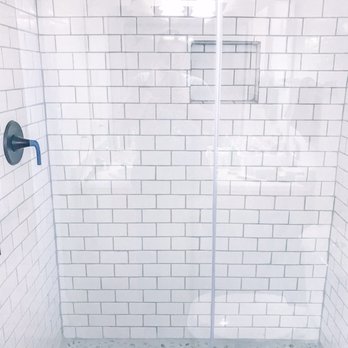 Honey Do - a shower with a glass door - Landscaping Near Me