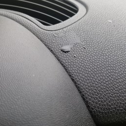 Water leaking inside windshield on dashboard Water leaking inside windshield on dashboard