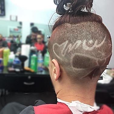 Adrian's Barbershop by null