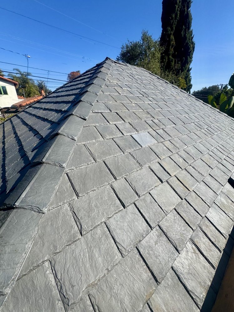 Slide of Economy Roofing