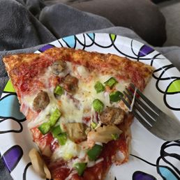Pizza with sausage and veggies