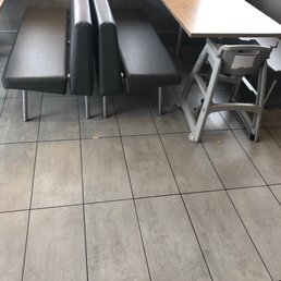 tables and benches in a restaurant