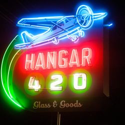 Neon sign, pole-mounted, outside