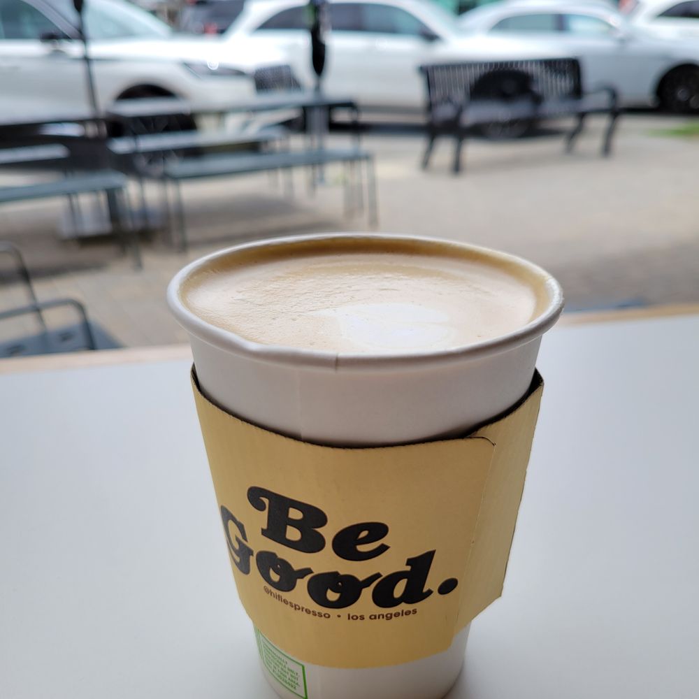 Hot latte with whole milk. Hot latte with whole milk.