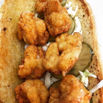 Funk Da Fried Fish & Chicken - a close up of a sandwich - Seafood Near Me - Dallas, Texas Funk Da Fried Fish & Chicken - a close up of a sandwich - Seafood Near Me - Dallas, Texas