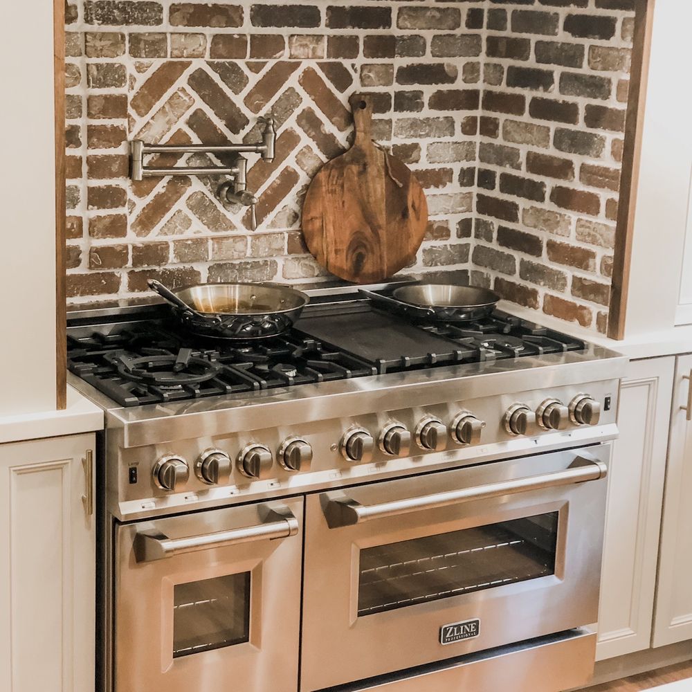 Stoneitup - Brick backsplash with walnut trim edges - Fireplace Services Near Me Stoneitup - Brick backsplash with walnut trim edges - Fireplace Services Near Me