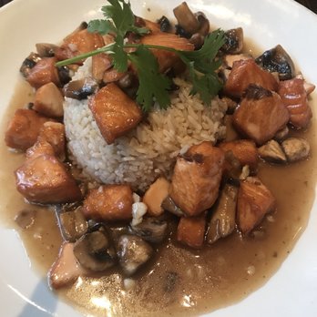 Spice - Salmon and mushrooms over rice. I didn't eat it all. I gave it to my husband. - Thai Near Me - New York, New York