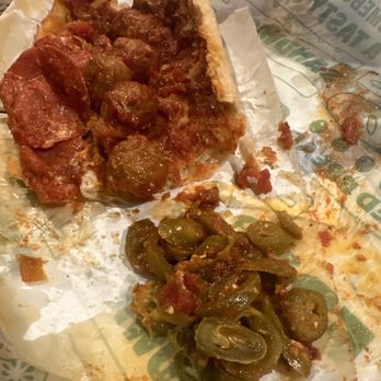 Subway - a half eaten pizza and a half eaten pizza - Sandwiches Near Me - Dana Point, California