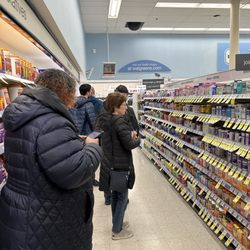 Walgreens - Line for pharmacy because drive thru is broken.