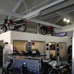 Motor Cycle Center - Vintage Triumph and MV above the sales offices