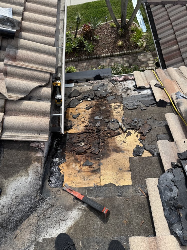 Slide of Sarmiento Roofing Services