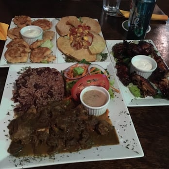 Caribbean Grilled Flavors - We had the wings, curry goat and two other appetizers our first night here in st marteen. Everything was delicious. Highly recommend it! - Caribbean Near Me - Melrose, Wisconsin