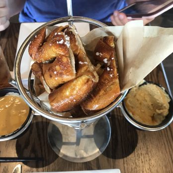 The Brass Tap - Pretzel with beer cheese and hummus. - American Near Me - Roanoke, Texas